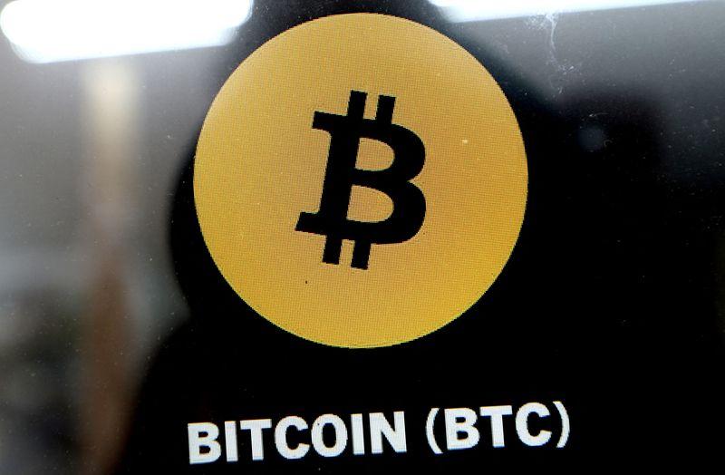 Bitcoin fell below $63,000, losing 50% from its October high.